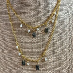 Chic Gold and Pearl Necklace with Black Accents